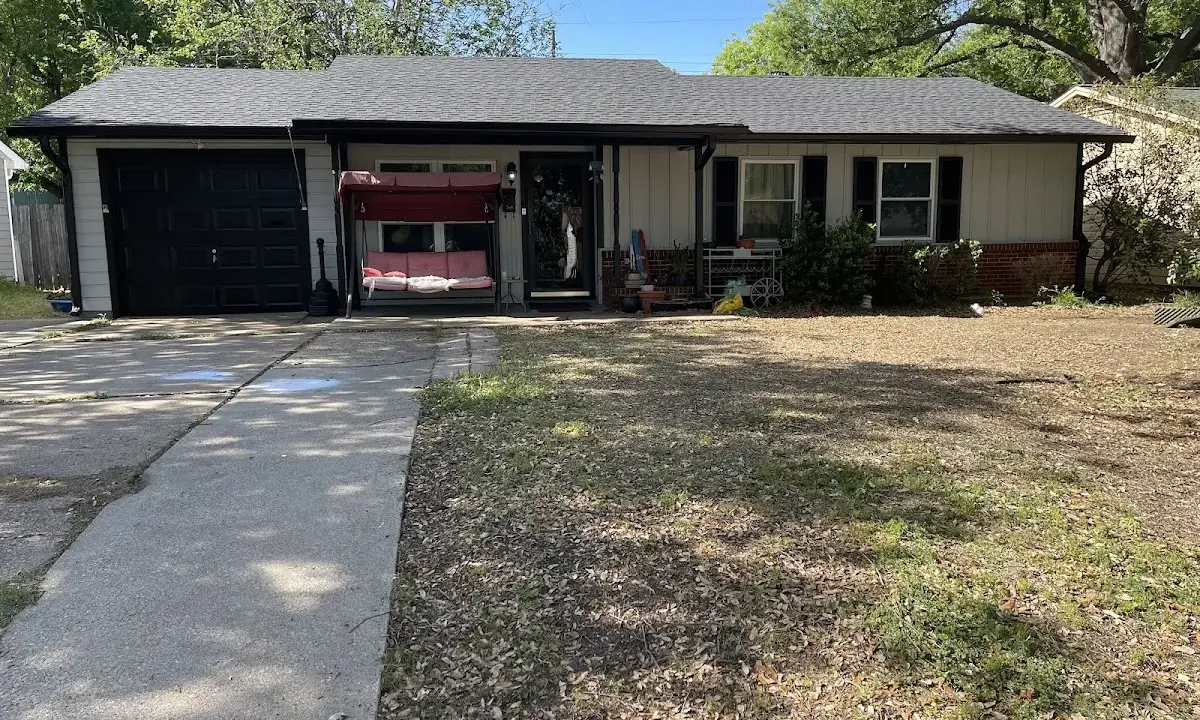 Metal Roof Installation crew at work on a residential roof in Tallahassee